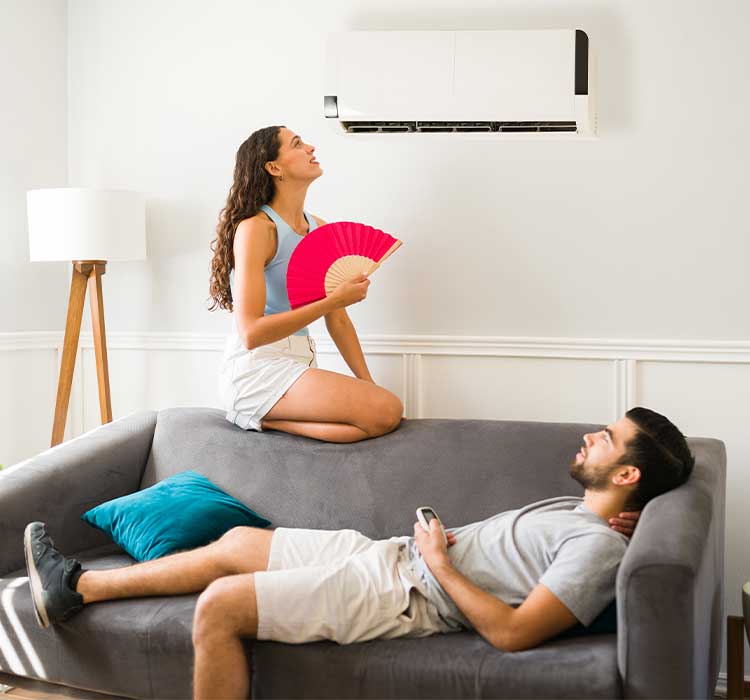 Young couple with Air conditioning not working