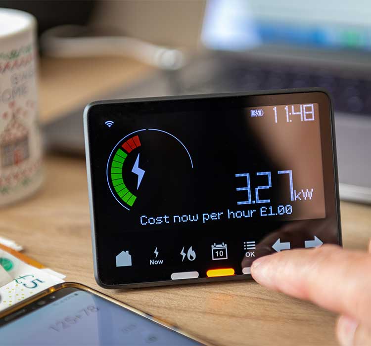 A person checking and calculating rising home energy cost with smart meter. Inflation, cost of living concept.